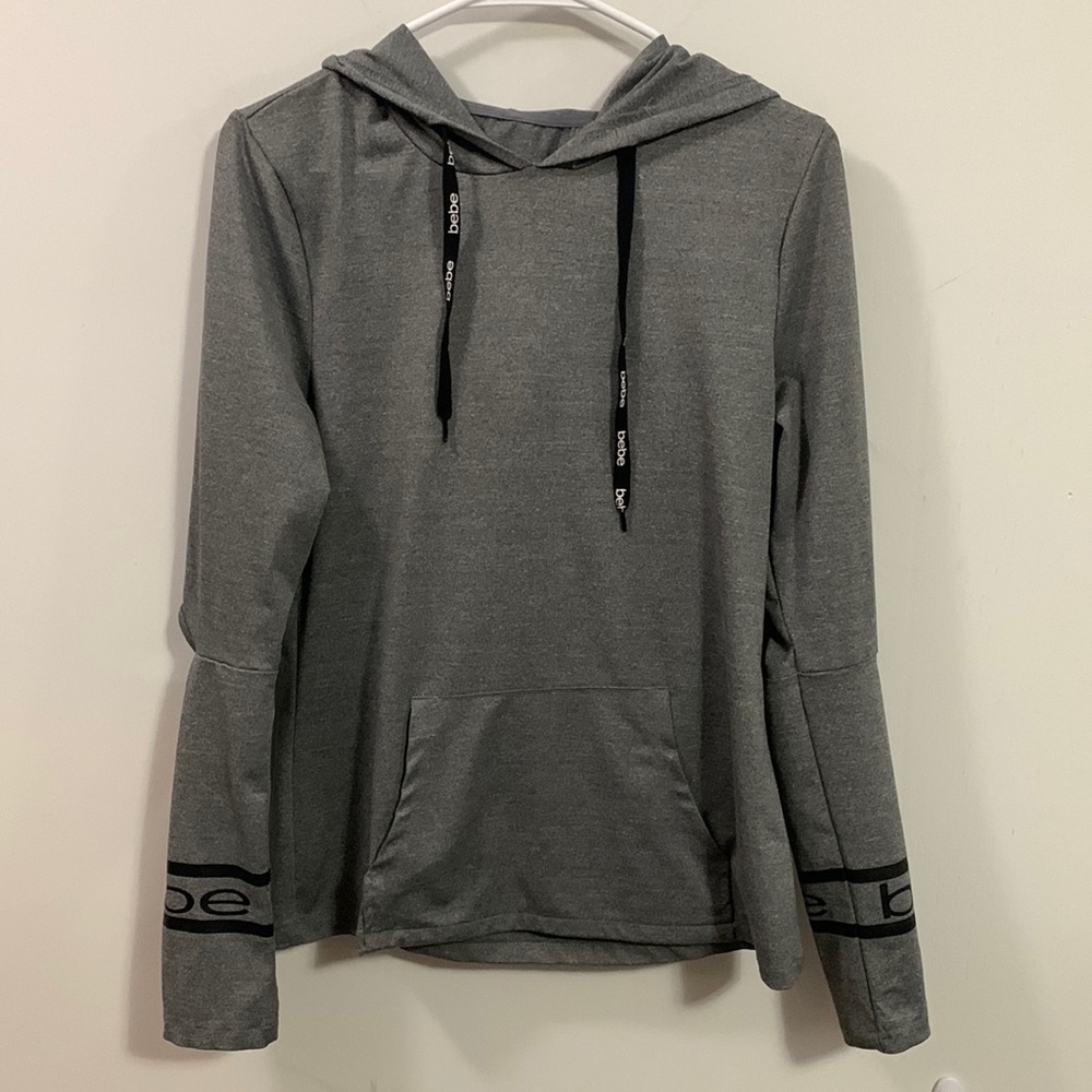Bebe hooded long sleeve with open elbows, size small great condition, fun fabric